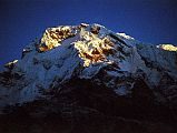 102 Annapurna South Sunrise From Chomrong The sun slowly started to rise, shining very brightly on Annapurna South, taken from Chomrong.